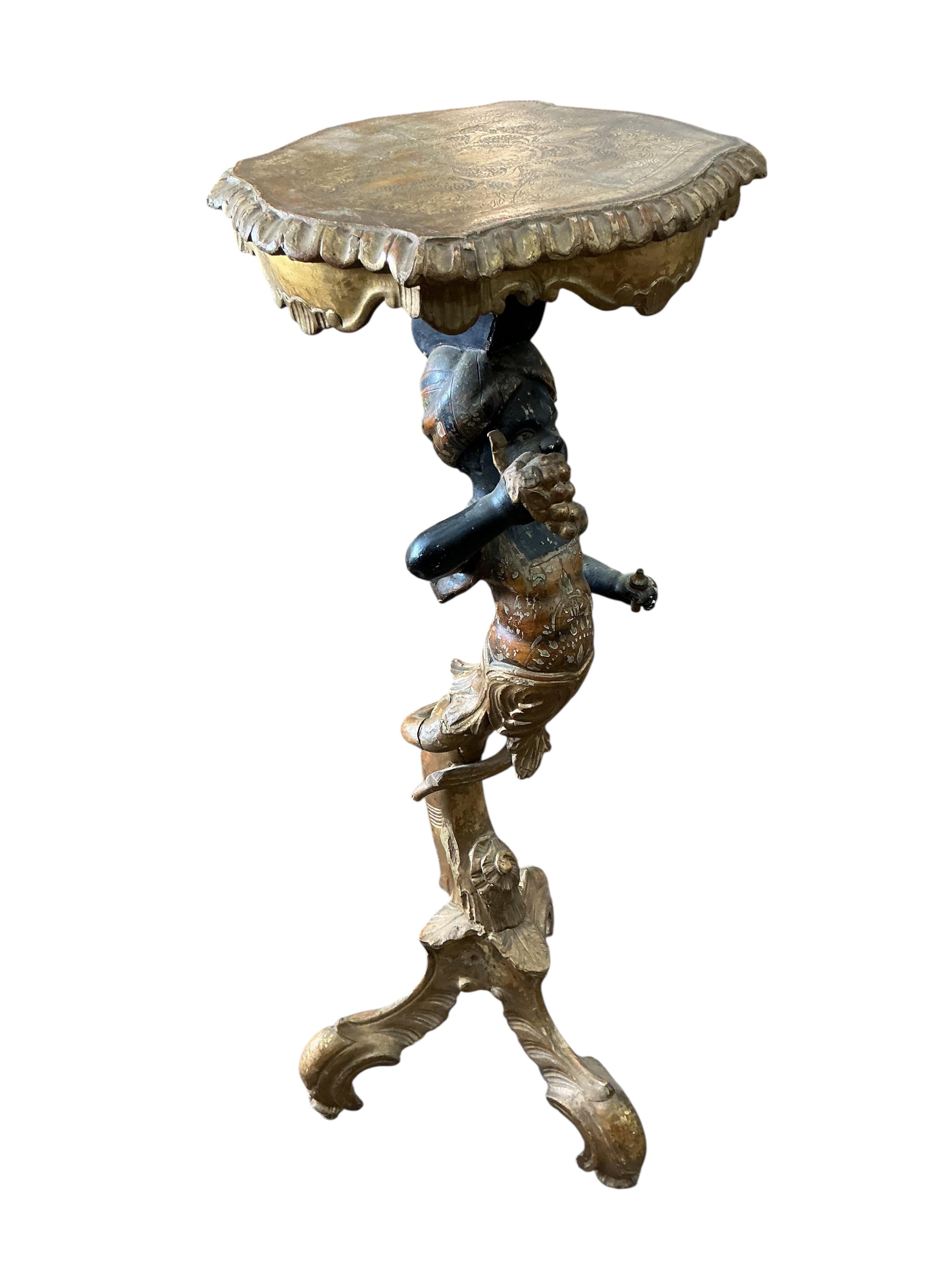 A Venetian polychrome carved wood Blackamoor torchere stand, height 96cm